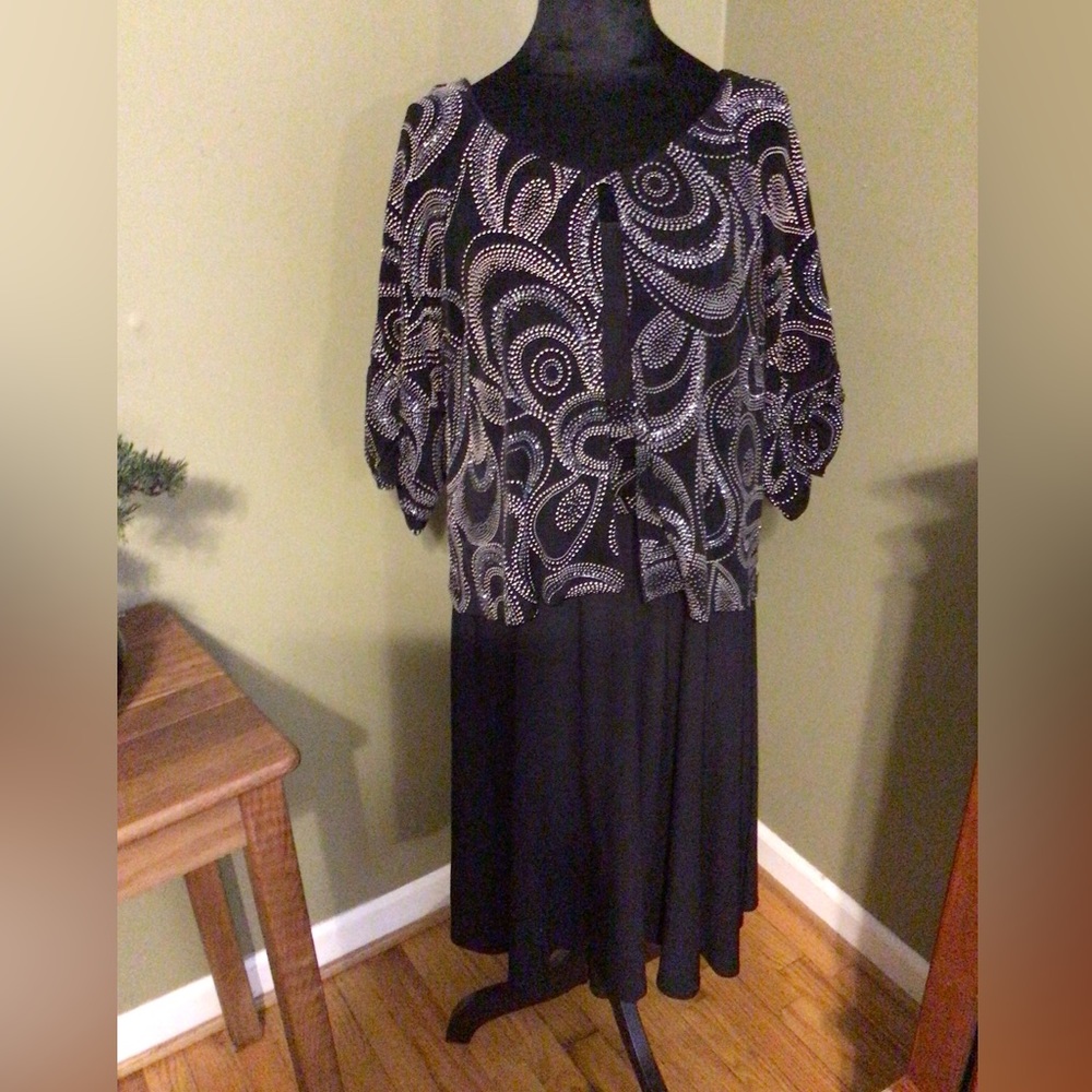Mother of the bride elegant black silver dress with sparkled jacket.